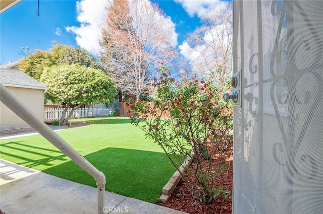 view of yard featuring fence