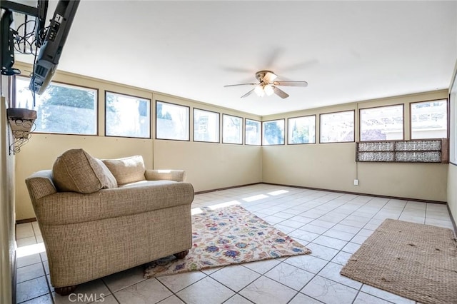 sunroom / solarium with ceiling fan