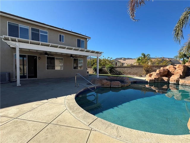 view of pool featuring ceiling fan, cooling unit, and a patio area