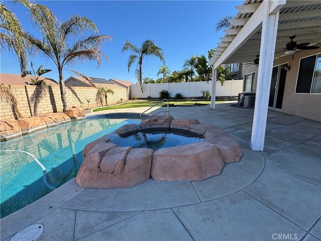 view of swimming pool with an in ground hot tub, a patio, ceiling fan, and central air condition unit