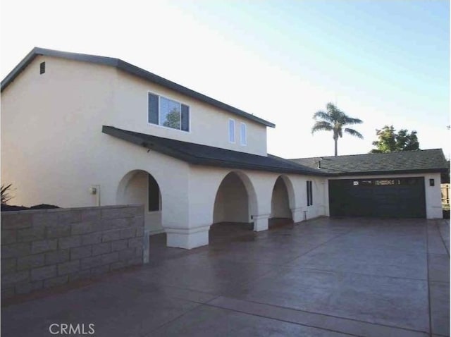 view of front of home featuring a garage