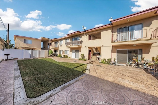 exterior space featuring a yard and a patio