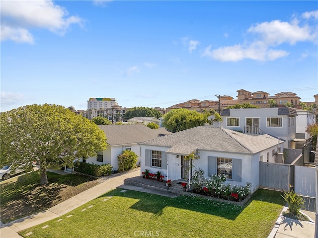 view of front of property with a front lawn