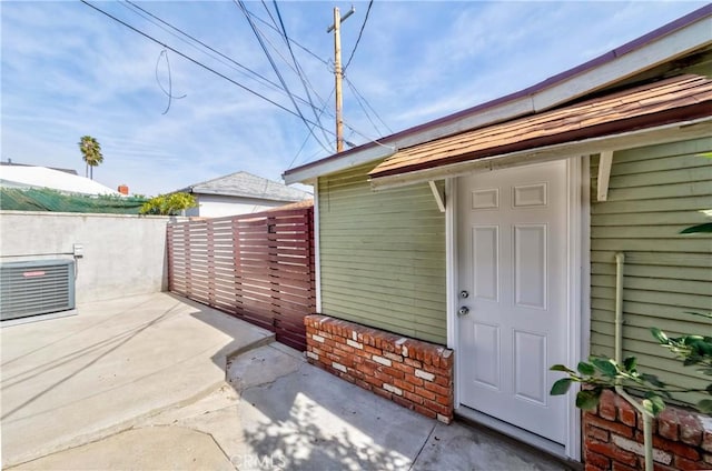 entrance to property with a patio