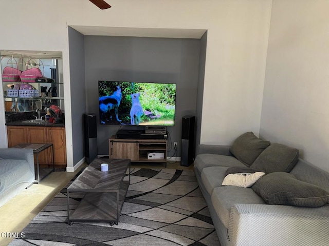 living room with ceiling fan