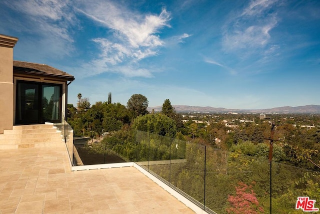 view of patio with a mountain view