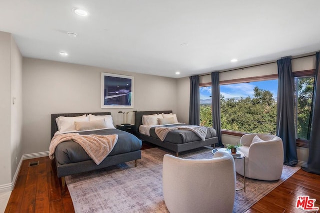 bedroom featuring wood-type flooring