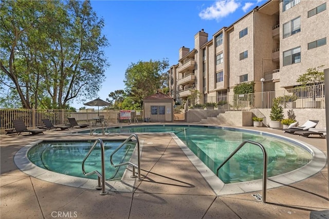 view of pool with a patio area