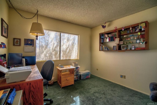 home office with carpet floors and a textured ceiling