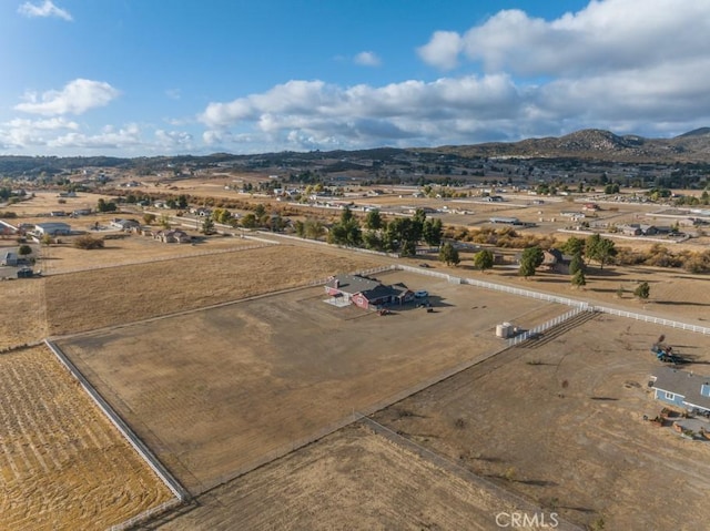 bird's eye view featuring a mountain view and a rural view