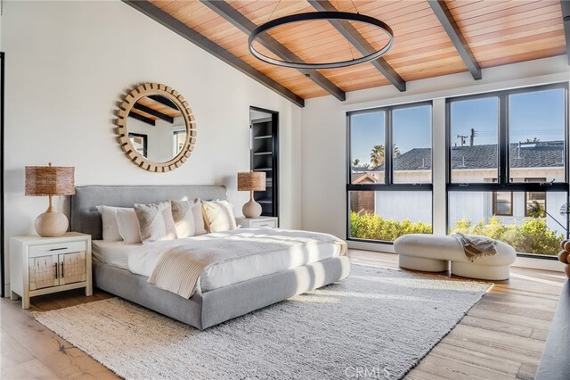 427 Santa Ana Ave, Newport Beach, CA 92663 - bedroom with wood ceiling, multiple windows, and wood finished floors