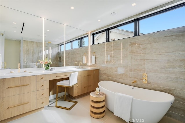 427 Santa Ana Ave, Newport Beach, CA 92663 - bathroom with tile walls, a soaking tub, and double vanity