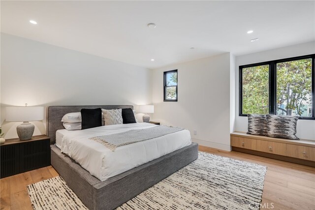 427 Santa Ana Ave, Newport Beach, CA 92663 - bedroom with light wood-style flooring and recessed lighting