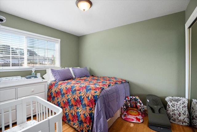 bedroom featuring light wood-type flooring