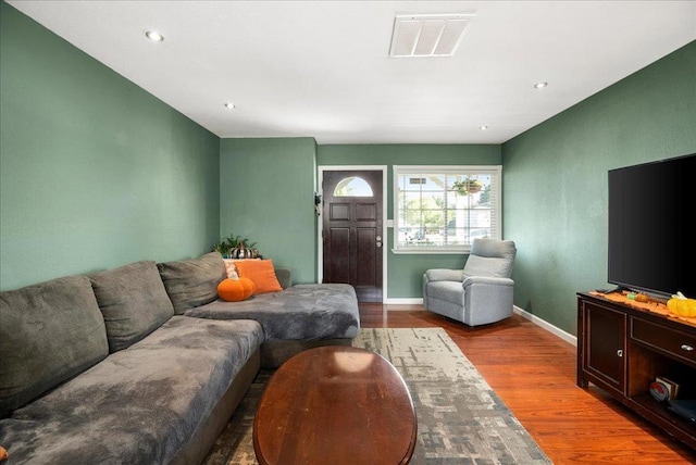 living room with light hardwood / wood-style floors