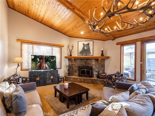 carpeted living room with lofted ceiling with beams, a fireplace, and wood ceiling