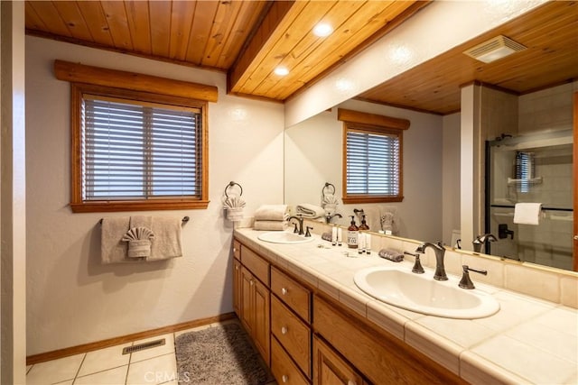 bathroom featuring tile patterned flooring, vanity, wood ceiling, and a shower with shower door