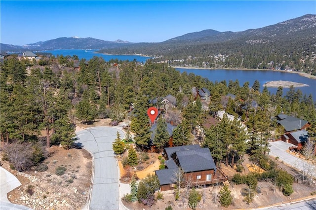 bird's eye view with a water and mountain view