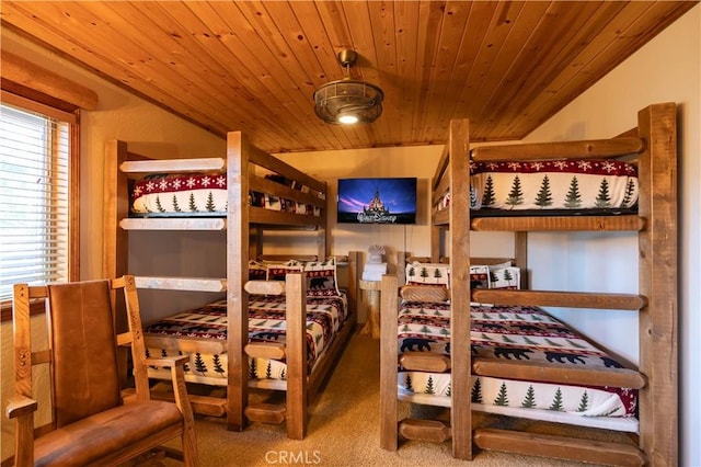 carpeted bedroom featuring wooden ceiling