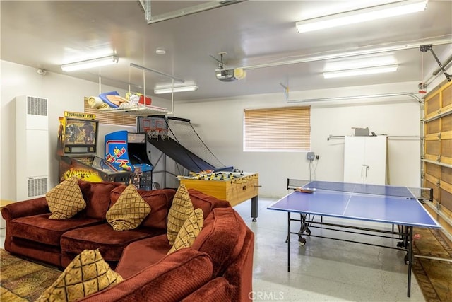 playroom featuring concrete flooring