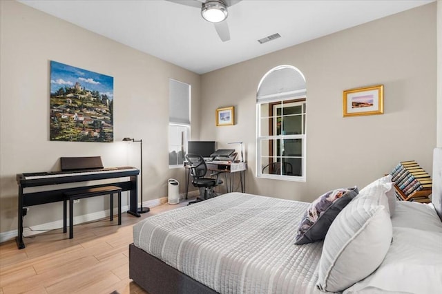 bedroom featuring ceiling fan and light wood-type flooring