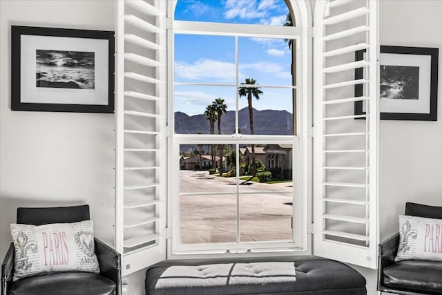 doorway to outside with a mountain view