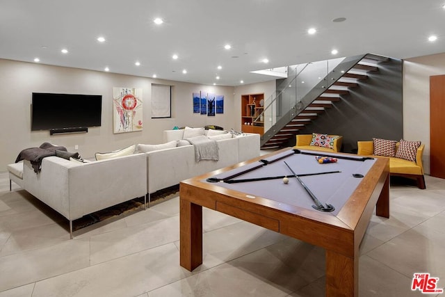 rec room featuring light tile patterned floors and pool table