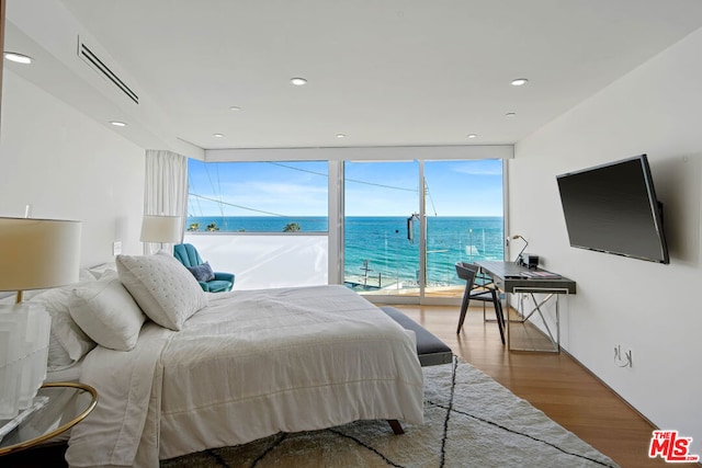 bedroom featuring hardwood / wood-style flooring