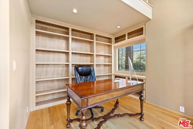 office area with hardwood / wood-style floors