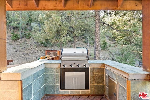 view of patio / terrace featuring a grill