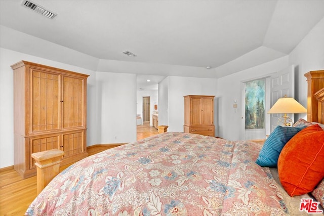 bedroom featuring light wood-type flooring