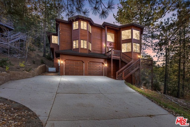 view of front of home with a garage