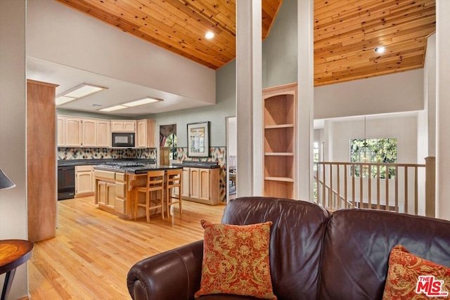 living room with light hardwood / wood-style flooring, high vaulted ceiling, and wood ceiling