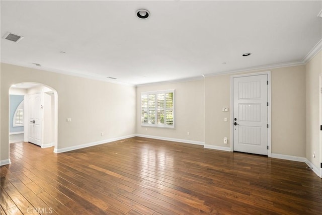 interior space featuring dark hardwood / wood-style floors and crown molding