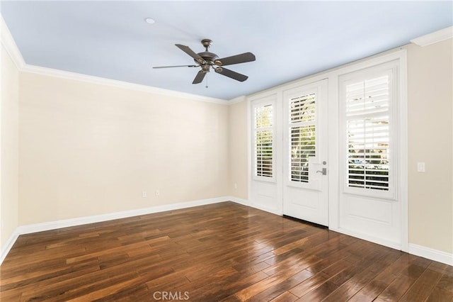 unfurnished room with ceiling fan, ornamental molding, and dark wood-type flooring