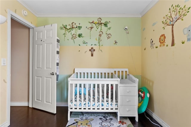 806 Coriander Dr Unit G, Torrance, CA 90502 - bedroom with ornamental molding, a crib, and wood finished floors