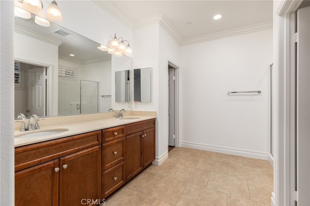 bathroom featuring vanity, tile patterned floors, a shower with shower door, and crown molding