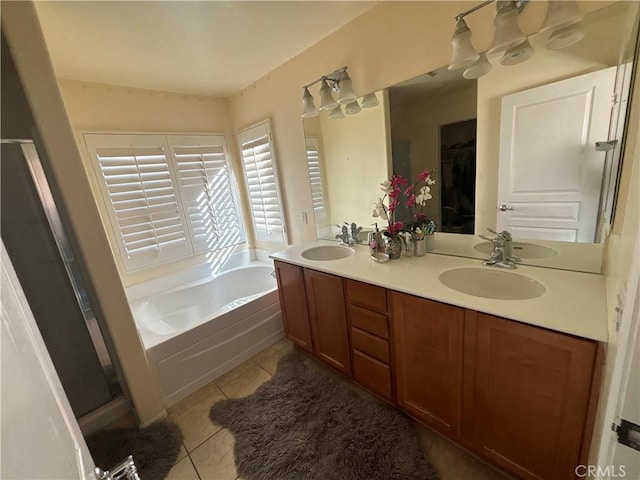 bathroom featuring tile patterned flooring, vanity, and independent shower and bath