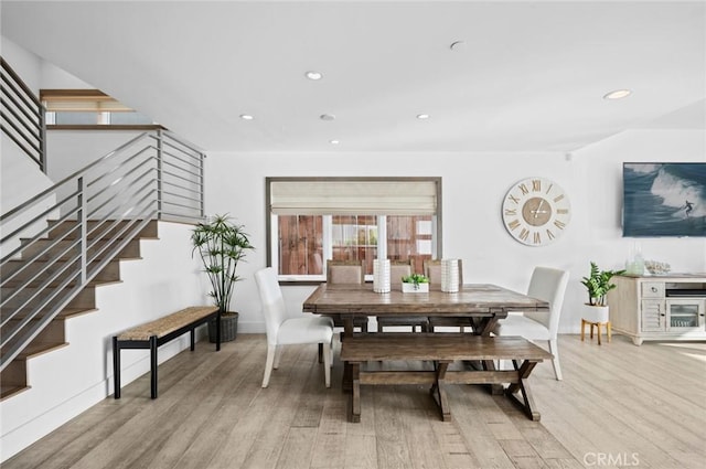 dining room featuring light hardwood / wood-style floors