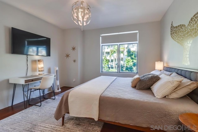 bedroom featuring dark hardwood / wood-style floors