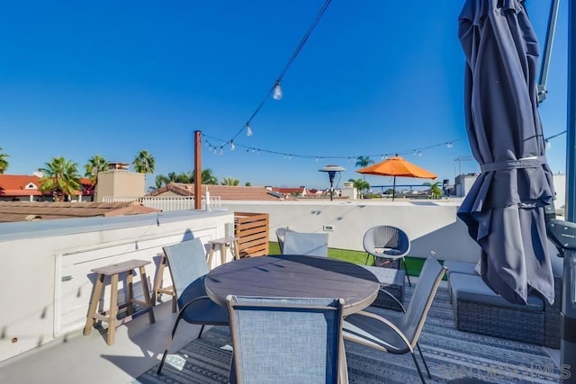 view of patio with an outdoor bar