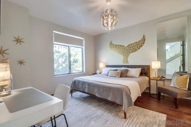 bedroom featuring dark hardwood / wood-style flooring