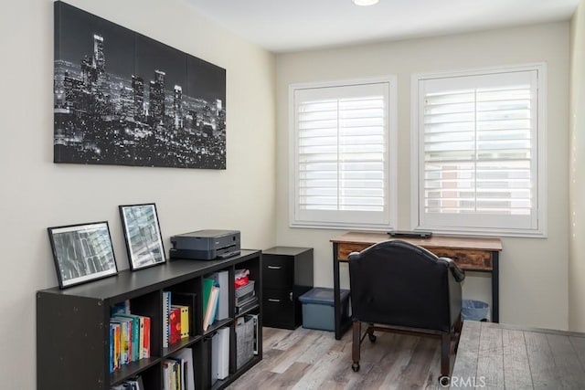 home office featuring light hardwood / wood-style floors