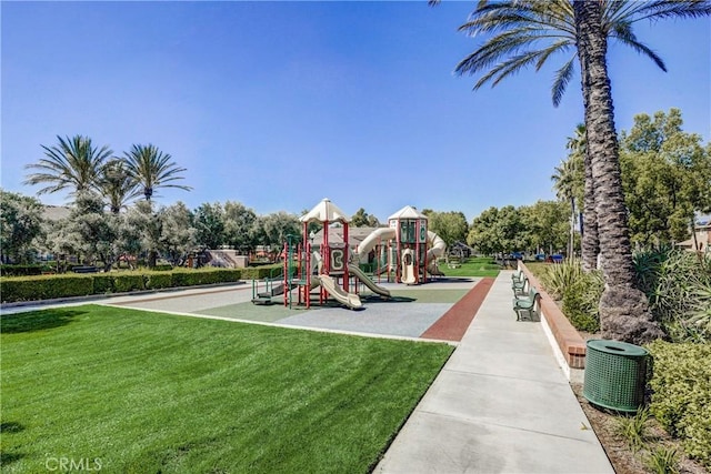 view of play area featuring a lawn