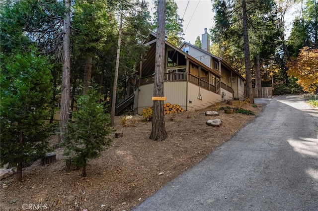 view of property exterior featuring a balcony