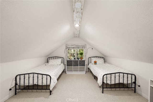 bedroom with vaulted ceiling with beams, light colored carpet, and a textured ceiling