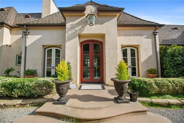 doorway to property with french doors