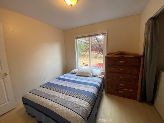 bedroom featuring light hardwood / wood-style flooring