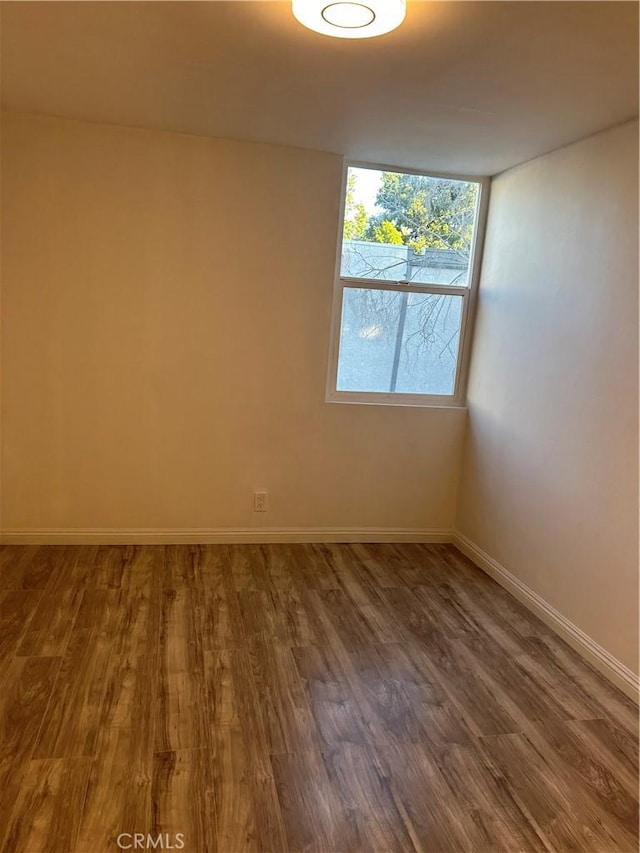 empty room featuring hardwood / wood-style floors