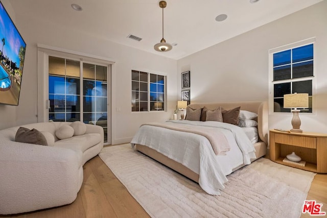 bedroom featuring hardwood / wood-style flooring